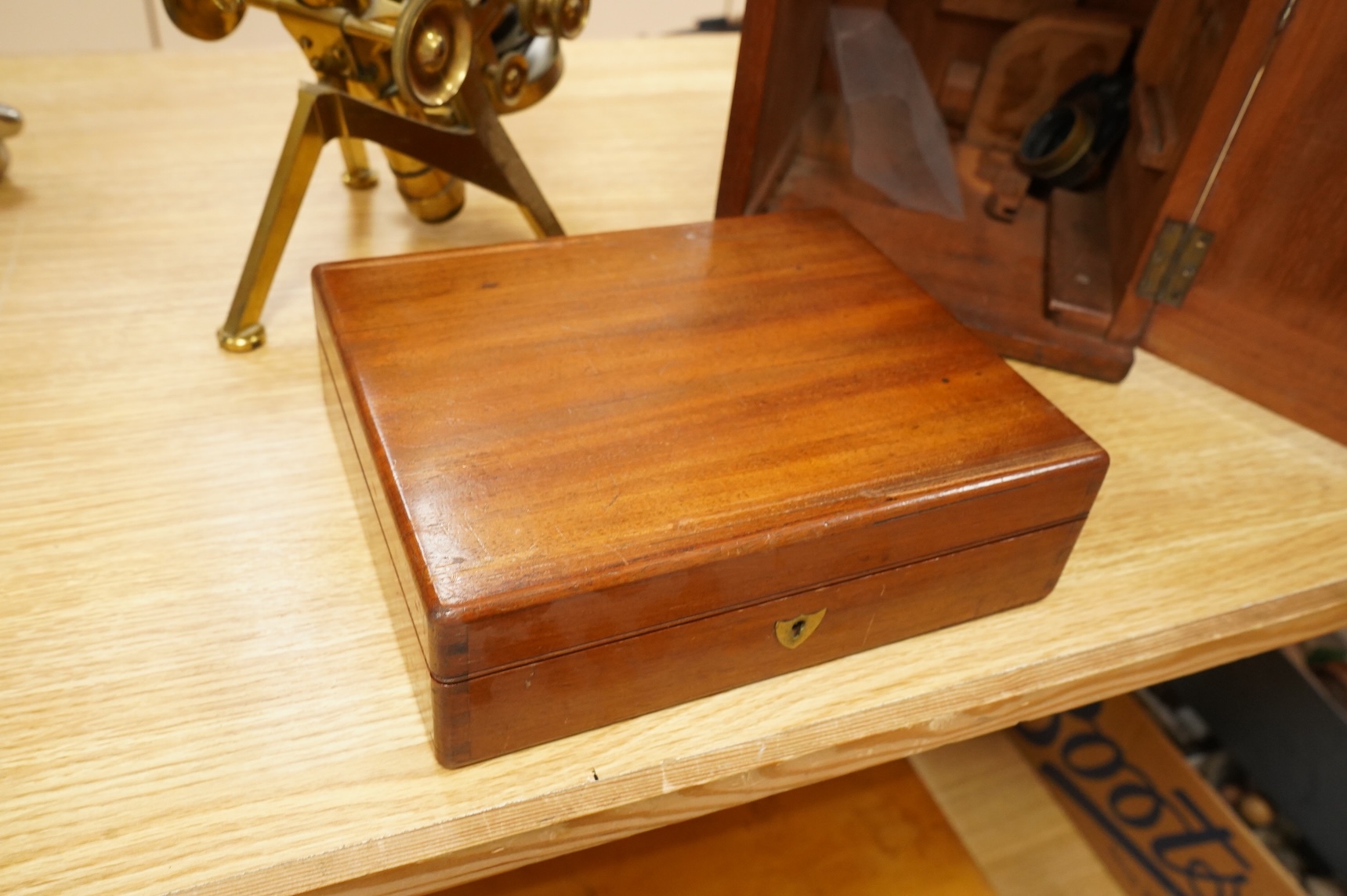 A fine mid 19th century brass compound monocular microscope, by Powell and Lealand, 170, Euston Road, London, dated 1869, mahogany cased, together with a mahogany cased accessory box, containing - 7 objectives, 4 Leiberk